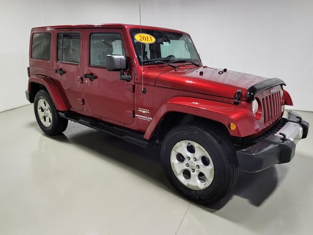 Used 2013 Jeep Wrangler Unlimited Sahara with VIN 1C4BJWEG9DL603287 for sale in Pinconning, MI